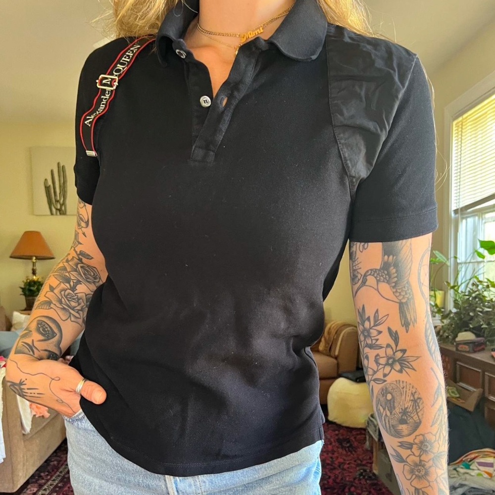 Alexander McQueen black polo shirt with a red and black logo